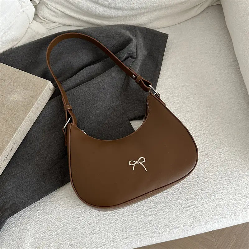 White Crescent Shaped Shoulder Bag with Bow Detail