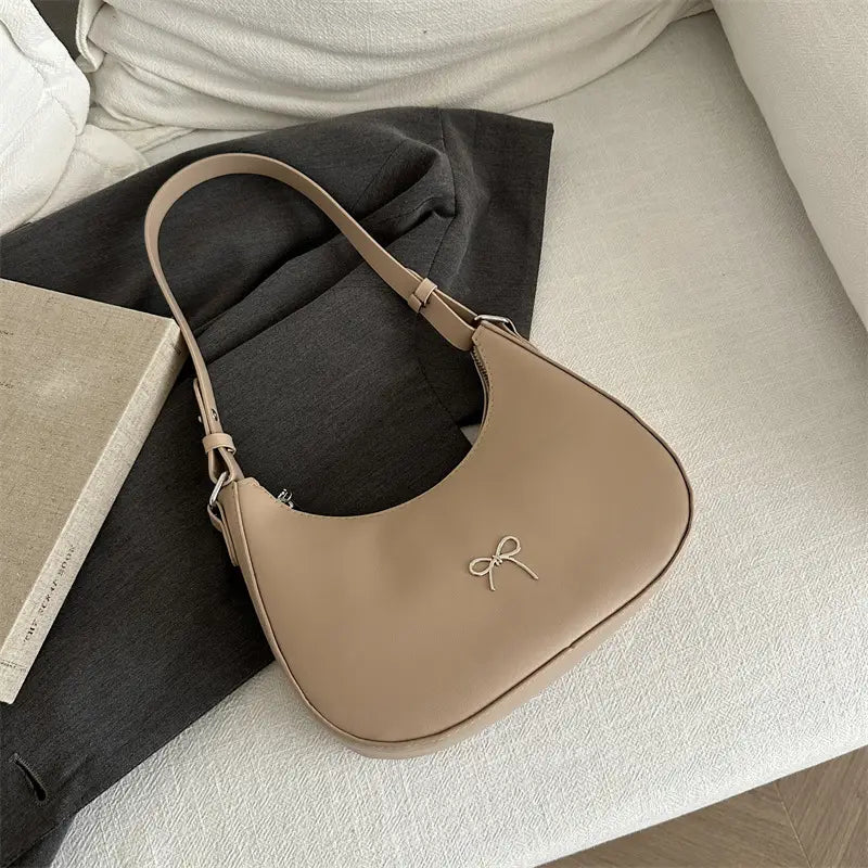 White Crescent Shaped Shoulder Bag with Bow Detail