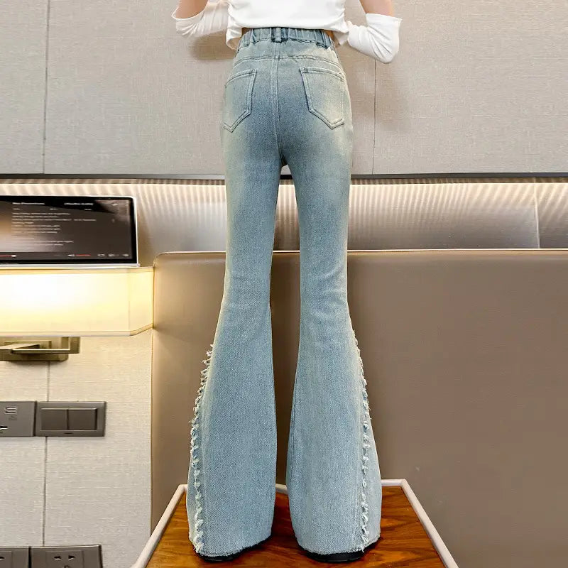 Light Blue Bell-Flare Jeans with Raw Edge Detail